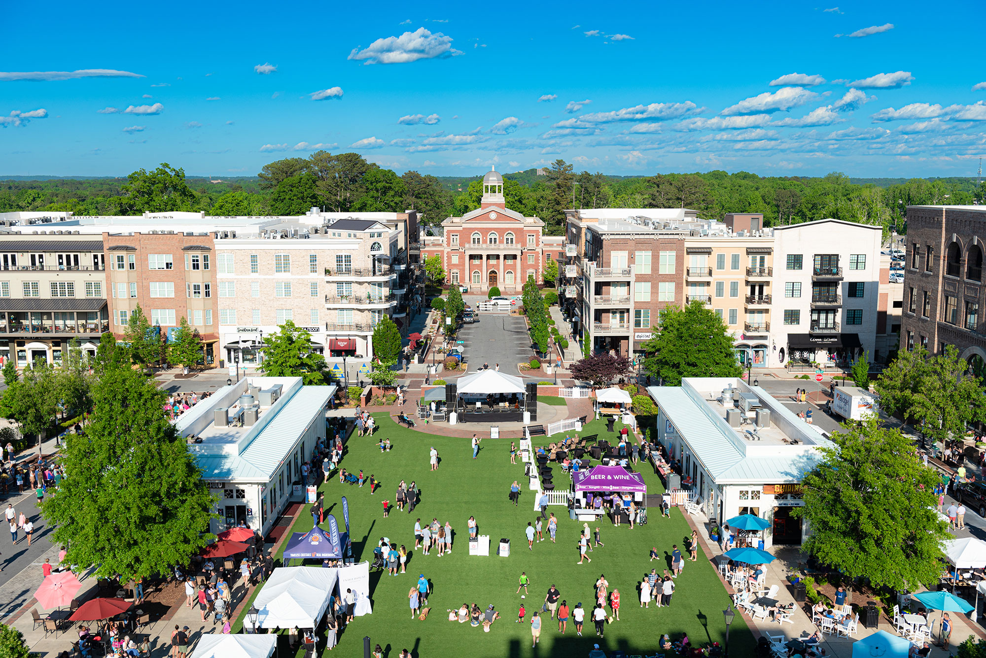 aerial daytime downtown alpharetta people greenspace